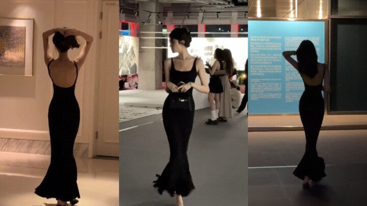 พี่เจินจีเหรอ? หุ่นดีเกินไปแล้วนะ! ยิ่งใส่เดรสยาวสีดำแบบนี้เข้าไป ชัดเจนว่าเป็นเจินจีตัวจริงแน่นอน!