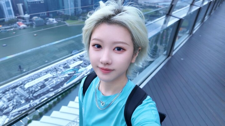 What was it like to be invited by Warner to Singapore to attend the premiere of Coldplay's new song?