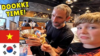 AMERICANS Try KOREAN FOOD for the FIRST TIME in Hanoi, Vietnam 🇻🇳 | Dookki Korean Topokki Buffet
