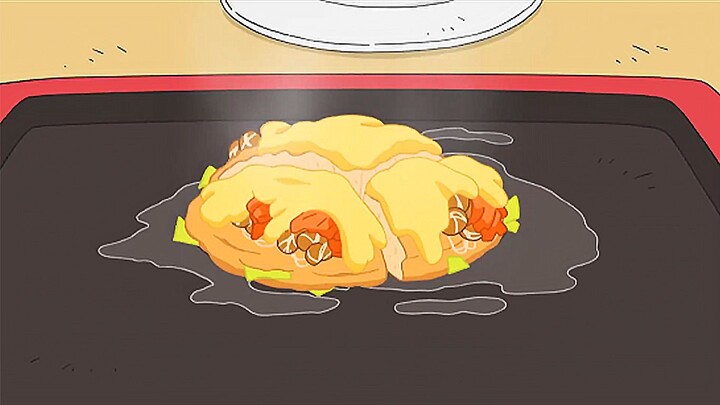 "Okonomiyaki, with its unique texture and flavor, is like a flower blooming in flames, making people