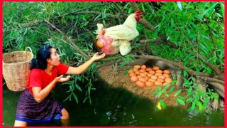 Women Find Fish For Food Meet Big White Chicken With Egg At River.