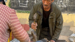 Rural blacksmith, husband and wife working together