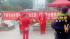 Sept 29, Sichuan: Woman hires people to beat gongs and drums and hold banners reading “Taking a Conc