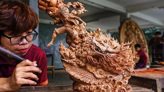 Wooden sculpture of the sun god Luffy versus Kaido!