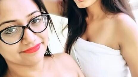 girl vs girl kiss AI