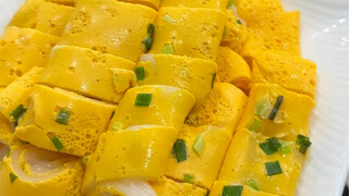 33. Seporsi irisan daun bawang dan sosis telur, lembut dan halus