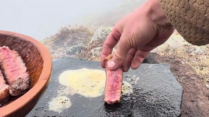 Natural slate-grilled tomahawk steak 🥩 + tile-baked trout