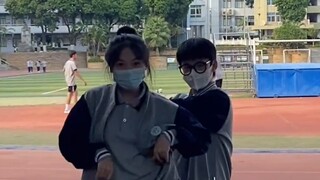Ordinary high school students dance pingpong on the playground