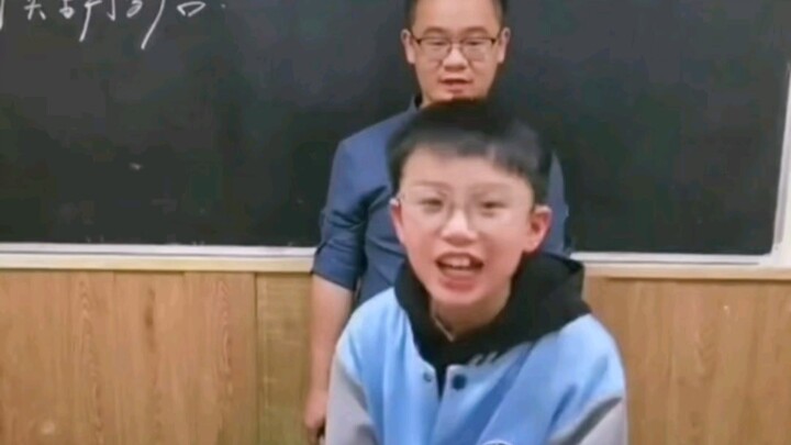 I can’t do it—teacher and student in the same frame