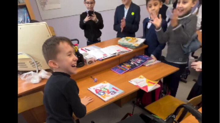 How thrilled the kids were when they found out this boy had learned to stand!