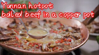 Yunnan hotpot: boiled beef in a copper pot