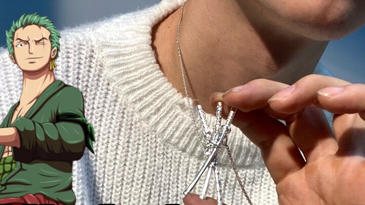 A new up master made a necklace for Zoro's three swords. Please allow me to introduce myself. I'm ne