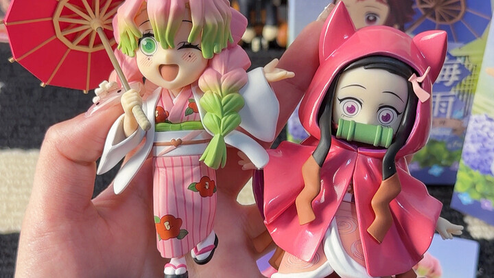 I'm snatching this hidden, temperature-sensitive Nezuko figure from the "Demon Slayer: Rainy Season"