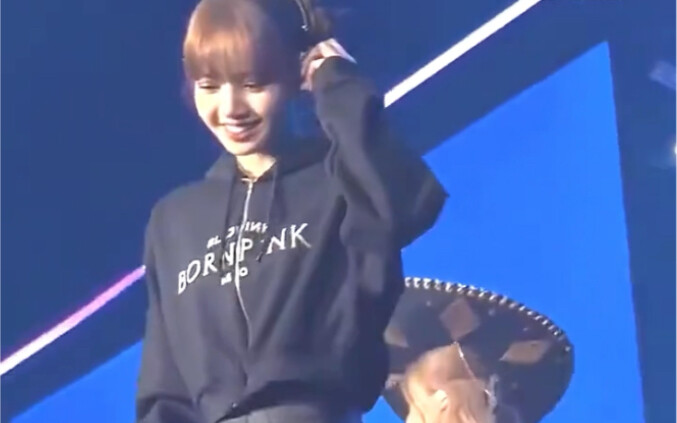Lisa’s stage presence is electric, with intense energy and close-up interactions with fans in the fr
