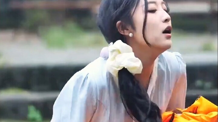 A woman holding a baby accidentally stumbled and fell, and the child happened to land right into the