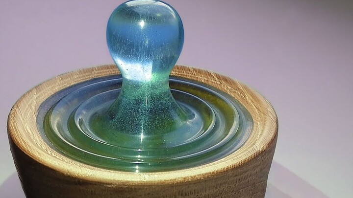 The moment the water drop falls and bounces, seal it with epoxy resin!