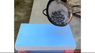 Blue Berries melting through styrofoam