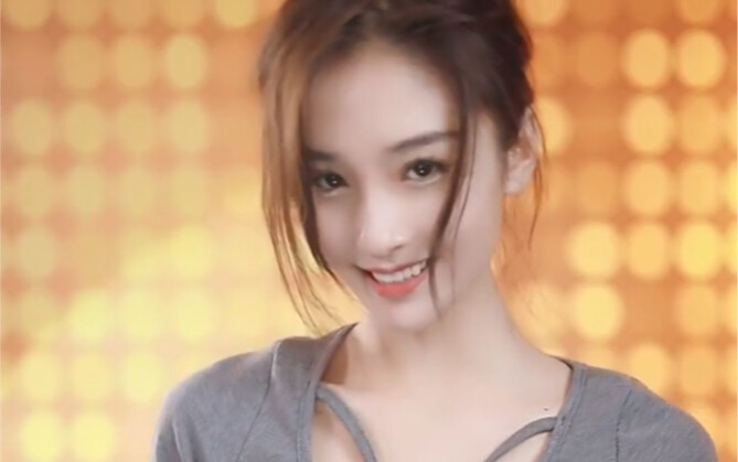 The girl in tight jeans dances, stands at attention and does a backhand knife, don't peek at my slim