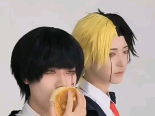 Matthew is just eating a cream puff.