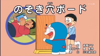 Doraemon papan lubang intip