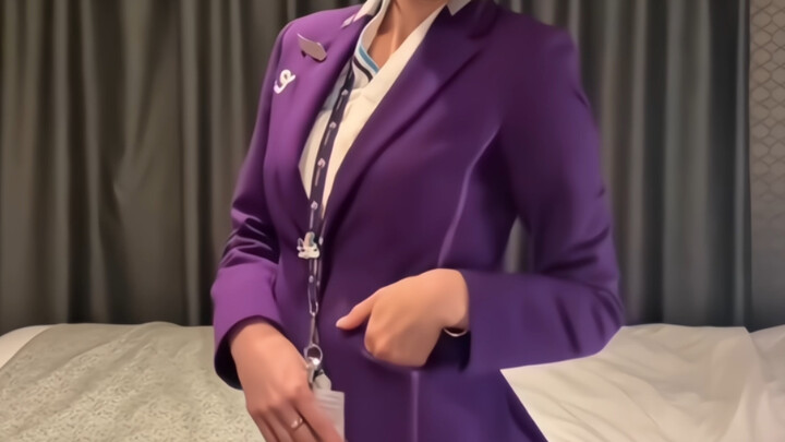 Hong Kong Express Airways’ image ambassador, a flight attendant, performs a perfectly timed dance in