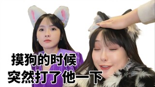 摸狗的时候打他一下……