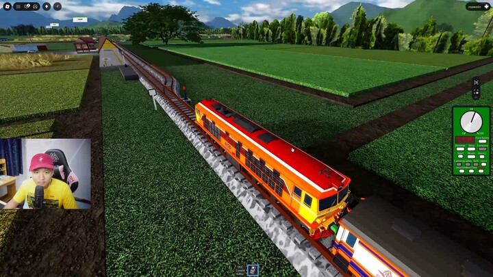 รถจักรวิ่งทำขบวนยาวๆบนทางรถไฟจิ๋ว