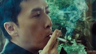 Ip Man tests the boy with a cigarette