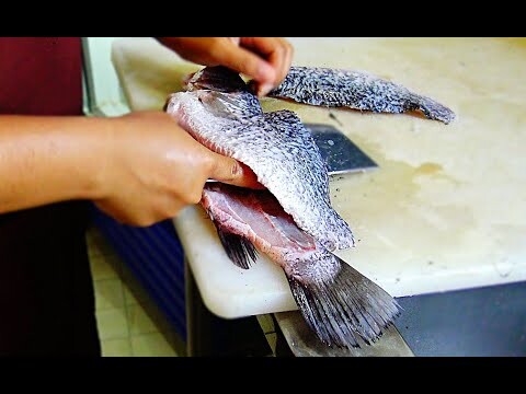 Fried snapper topped with sauce (Thai style) ,揚げシーバス , ปลากระพงทอดน้ำปลา