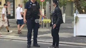 Can you drink in public on the streets of France? An American guy plans to use props to test it out.