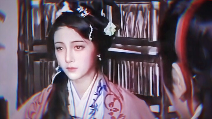 She from a thousand years ago... "A gentle breeze scatters petals, her brows gently furrowed with so