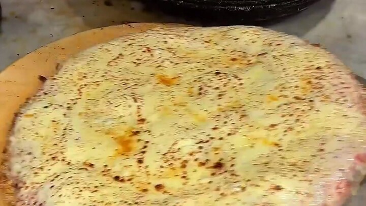 Extra Large Cheese-Strung Pizza