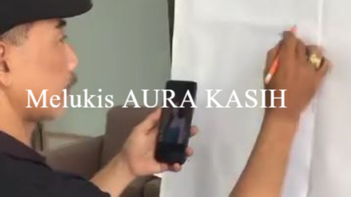 Lagi nglukis siapa ini