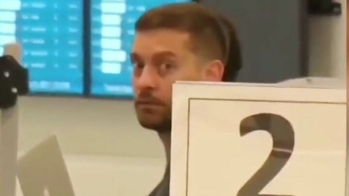 The three Spider-Men were going through security at the airport. They looked helpless when they were