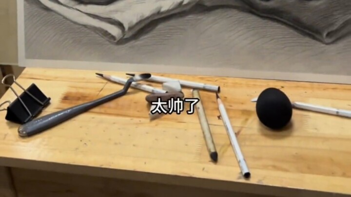 Art students go wild and cheer as they rip off paper tape!