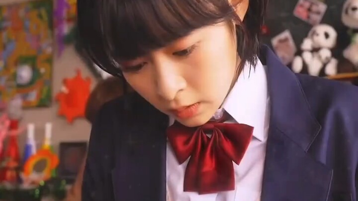 Whatever the girl writes on the test paper, that's exactly what will happen in the real world.